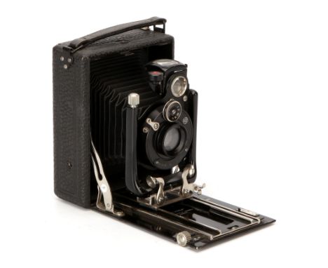 A Negretti & Zambra Viadem Folding Camera, 1905-1919, with Contar Anastigmat f/6.8 5Â¼" lens, serial no. 120088, body, VG-E, 