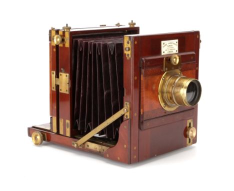 A Horne, Thornthwaite & Wood Half Plate Mahogany Tailboard Camera, brass bound corners, 1886, with Ross Rapid Symmetrical f/6