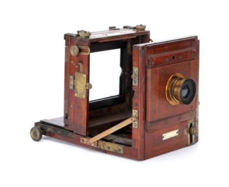 A Sands & Hunter Exhibition Quarter Plate Mahogany Tailboard Camera, 1887, with Ensign Symmetrical f/8 brass lens, body, P-F,