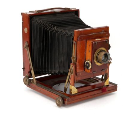 A 'Thornton-Pickard College' Half Plate Mahogany Field Camera, 1912-1936, with Aldis Anastigmat No.7 f/7.7 brass lens, in shu