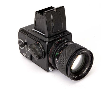A Hasselblad 2000FCW Camera, black, serial no. RC1521486, with Carl Zeiss Sonnar T* f/2.8 150mm lens, black, serial no. 58838