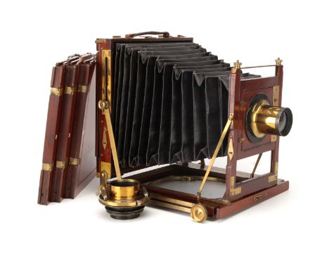 A Ross Whole Plate Mahogany Field Camera, 1899, with Ross Rapid Symmetrical 8Â½x6Â½" Waterhouse stop lens, brass, serial no. 