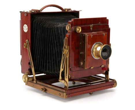 A Thornton-Pickard Royal Ruby Half Plate Mahogany Field Camera, triple extension, 1900, with Beck Primus f/8 brass lens, in T