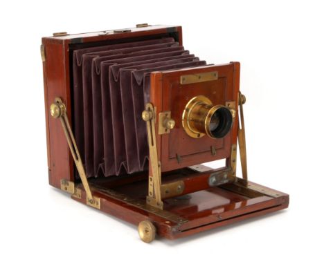 A J. J. Aktinson Eclipse Half Plate Mahogany Field Camera, 1891, with Swift & Son Rapid Paragon Waterhouse stop 6x5" lens, br