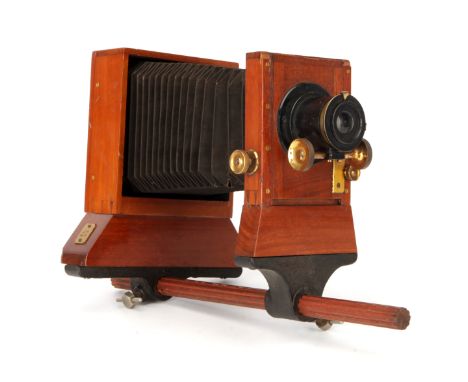 A W. Watson & Sons Mahogany Quarter Plate Monorail Lab Camera, 1890, internal flap shutter, with W. Watson & Sons Holostigmat