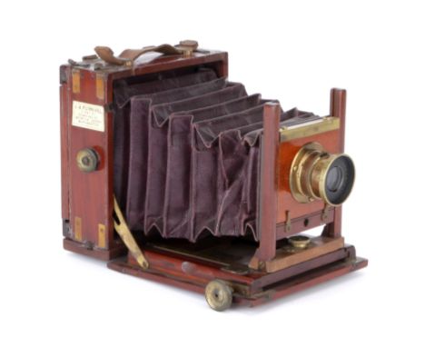 A James A. Furnivel Quarter Plate Mahogany Field Camera, 1875, with Beck Symmetrical f/8 lens, brass, body, G, repair to lowe