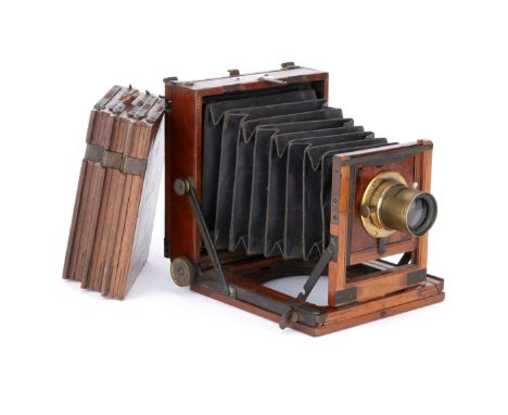 A Sharp & Hitchmough Gresham Quarter Plate Mahogany Field Camera, 1891, with unmarked f/8 brass lens, body, G-VG, lens board 