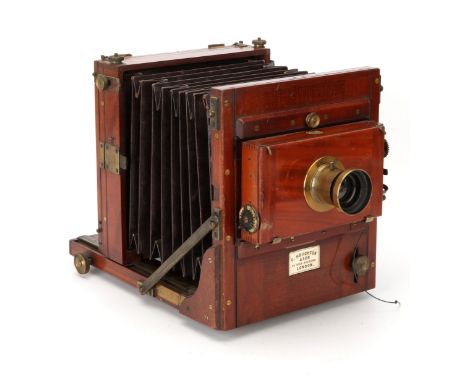 A George Houghton & Son Half Plate Mahogany Tailbaord Camera, 1880, with Esctior Rapid Aplomat No.2 Series G f/8 brass lens, 
