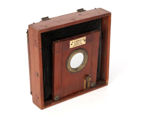 A Dawkins & Co. Half Plate Mahogany Field Camera, 1880, lacking lens and front bed, body, F; Marked to front 'W.A. Dawkins & 