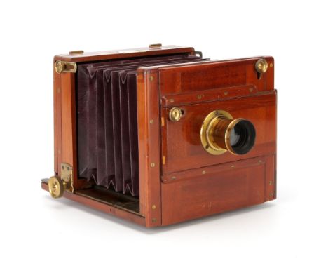 A W. Morley Portable Universal Half Plate Mahogany Tailboard Camera, 1886, with Ross Rapid Symmetrical Waterhouse stop 6x4" l