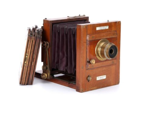 A J. Lancaster & Son 'The International' Patent Quarter Plate Mahogany Tailboard Camera, 1886, with a J. Lancaster & Son f/10