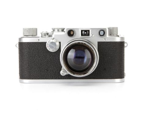 A Leica IIIf Rangefinder Camera, red dial, chrome, serial no. 619390, with Leitz Summitar f/2 50mm lens, chrome, serial no. 7