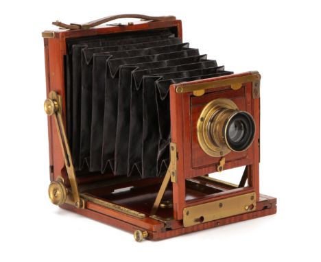 An A. H. Baird 4x5" Mahogany Field Camera, 1895, with C. P. Goerz Doppel Anastigmat f/8 brass lens, body, VG, lens, G, some l