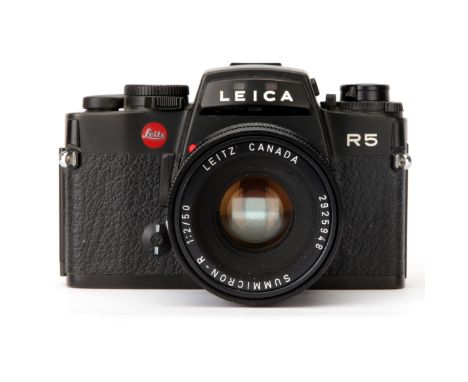 A Leica R5 SLR Camera, black, serial no. 1714503, with Leitz Summicron-R f/2 50mm lens, black, serial no. 2925948, body, VG, 