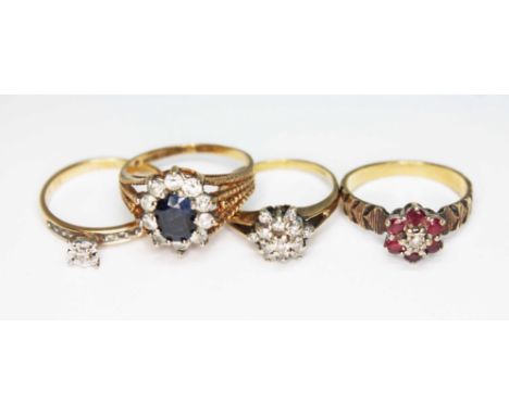 Four hallmarked 9ct gold cluster rings, gross wt. 9.2g, size K to N.  