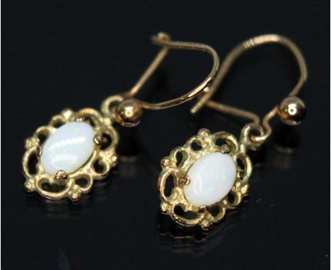 A pair of hallmarked 9ct gold precious opal earrings, gross wt. 1.1g.  