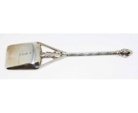A Victorian silver caddy spoon of ecclesiastical design, with orb finial, lozenge shaped shaft featuring an apostle above a s