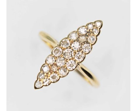 A navette diamond cluster ring, the cluster measuring approx. 6.65mm x 20.76mm, band indistinctly marked '18ct', gross wt. 2.