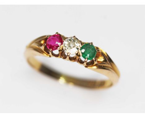 An antique diamond, ruby and green stone ring, marked '18', gross wt. 2.5g, size O.  Condition - green stone unidentified tho