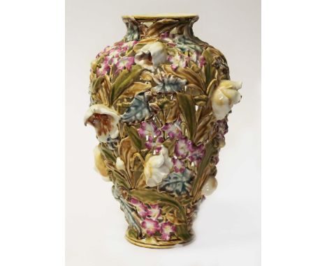 An Astro-Hungarian Zsolnay Art Nouveau pottery vase, pierced design with flowers, no. 3768, height 29.5cm.  Condition - chip 