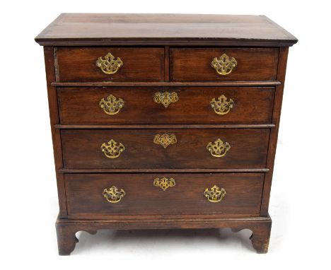 18th century oak chest of drawers, the rectangular top over two short and three graduated long crossbanded drawers each appli