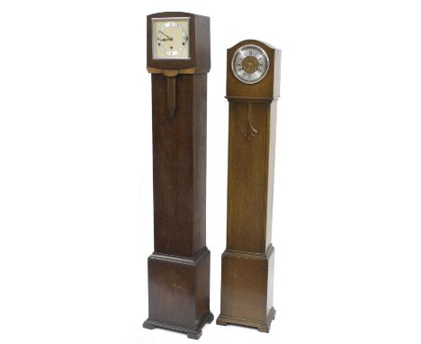 Art Deco oak cased three train musical grandmother clock striking on five rods, 54" high; also a grandmother oak clock case (