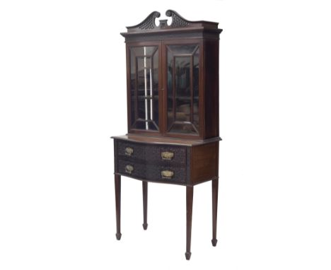 Attractive Edwardian mahogany display&nbsp;cabinet on stand, with a broken fret swan neck pediment over bevelled astragal gla