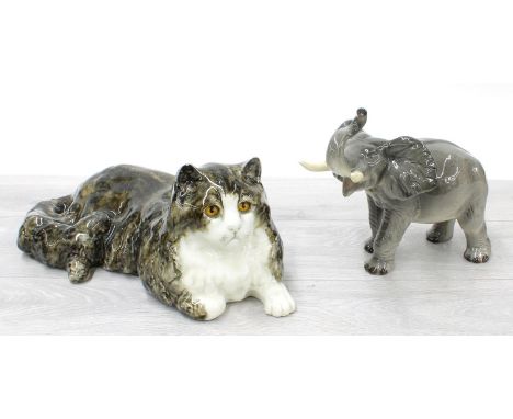 Large hand made pottery glazed figure of a recumbent cat by Mike Minton, 15" long; together with a Melba Ware glazed figure o