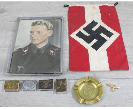 Small Nazi Party flag,&nbsp;measuring 15" x 9.5"; together with brass ashtray engraved with The Nazi eagle emblem, cap badge 