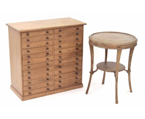 Pine collectors/specimen chest of twenty-four short drawers, 29" wide, 14" deep, 28.5" high; together with a circular oak two