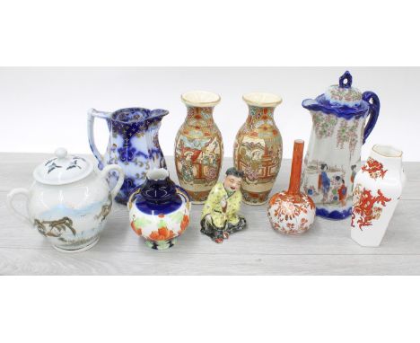 Pair of Japanese Satsuma baluster vases decorated with figures in typical pallet,&nbsp;7.25" high (one at fault to the rim); 
