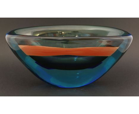 An Italian Murano glass vase,possibly by Flavio Poli for Seguso, in light blue glass with red and dark blue horizontal bands,