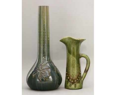 An Elton sunflower pottery vase,heavily potted, incised with a bearded iris in a green and blue glaze, inscribed 'Elton',39cm