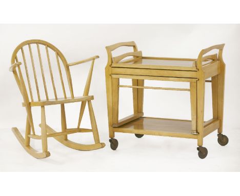 An Ercol child's rocking chair,labelled and with 'Utility Furniture' stamp, anda walnut hostess trolley,with a removable tray