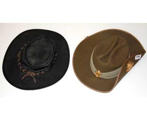 An Australian army bush hat and an Australian barmah collapsible leather hat.