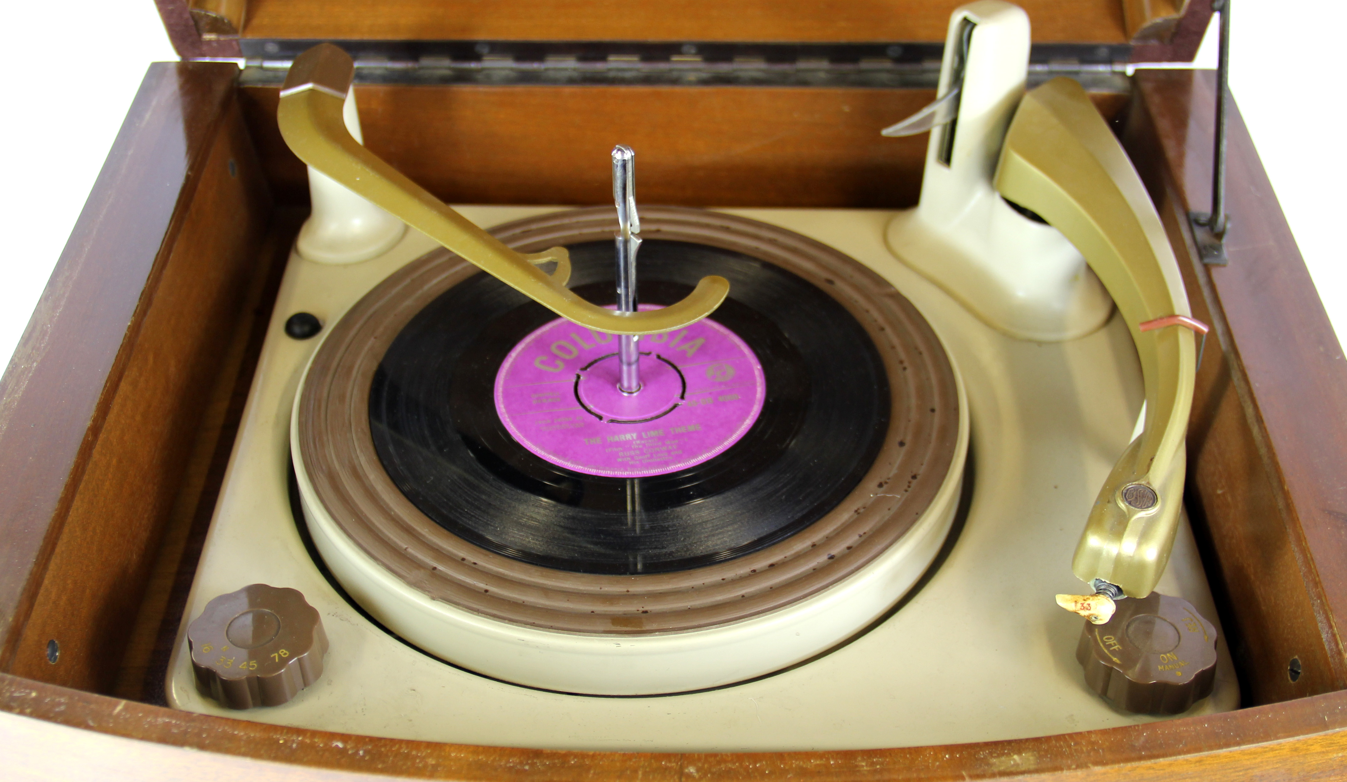 A vintage mahogany veneered record player and quantity of 78 RPM records.