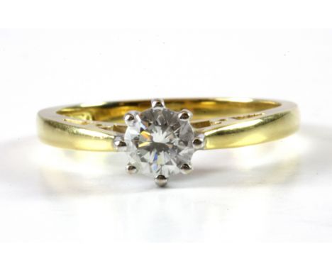 An 18ct yellow gold brilliant cut diamond set solitaire ring, approx. 0.40ct, (K.5).