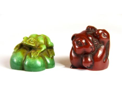 Two composition signed netsuke, H. 3cm.