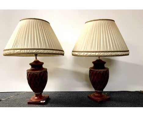 A pair of attractive ceramic table lamps and shades, H. 71cm.