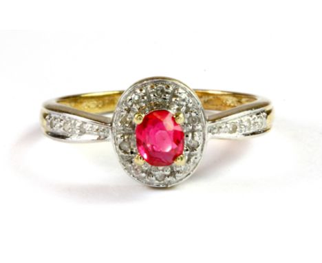 A 9ct yellow gold cluster ring set with a Burmese ruby surrounded by diamonds, (N.5).