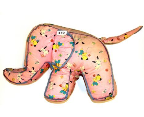 A 1960's soft elephant figure covered in Sooty and Sweep fabric, H. 26cm.