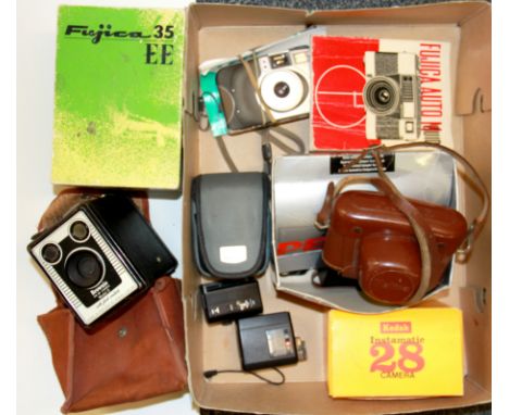 A quantity of vintage cameras.