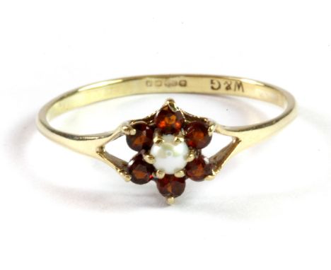 A 9ct yellow gold garnet and opal set cluster ring, (S).