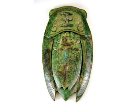 An unusual Chinese carved jade/ hardstone ink grinding stone in the form of a cicada, L. 14cm.