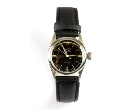 A boxed vintage Rolex  lady's wrist watch on a leather strap.