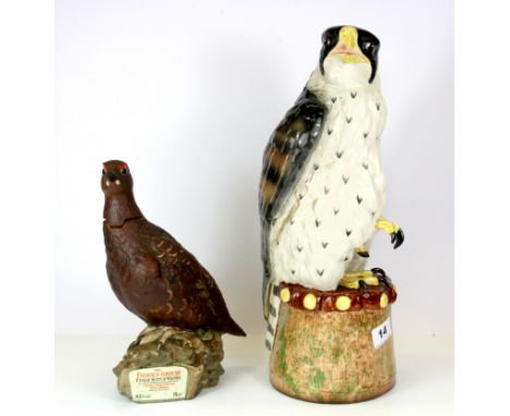 A Melba Ware china figure of an eagle, H. 38cm, together with with a Royal Doulton Famous Grouse whiskey bottle (empty).