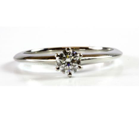 A Tiffany &amp; Co 925 platinum diamond solitaire ring, with a certificate stating is 0.27ct, colour H, clarity VS1, with Tif