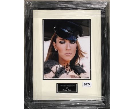 Autograph interest. A Framed autographed photograph of Celine Dion, 36 x 47cm, with Todd Meuller certificate.