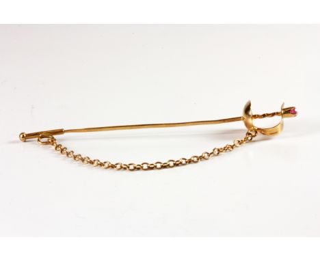 A Russian 14ct rose gold sword shaped brooch set with a ruby in an antique box, L. 7.2cm.