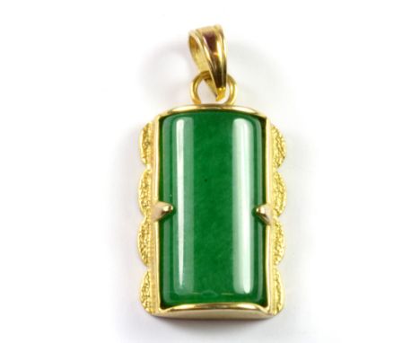 A 9ct yellow gold (stamped 9ct) mounted jade pendant, L. 3cm.